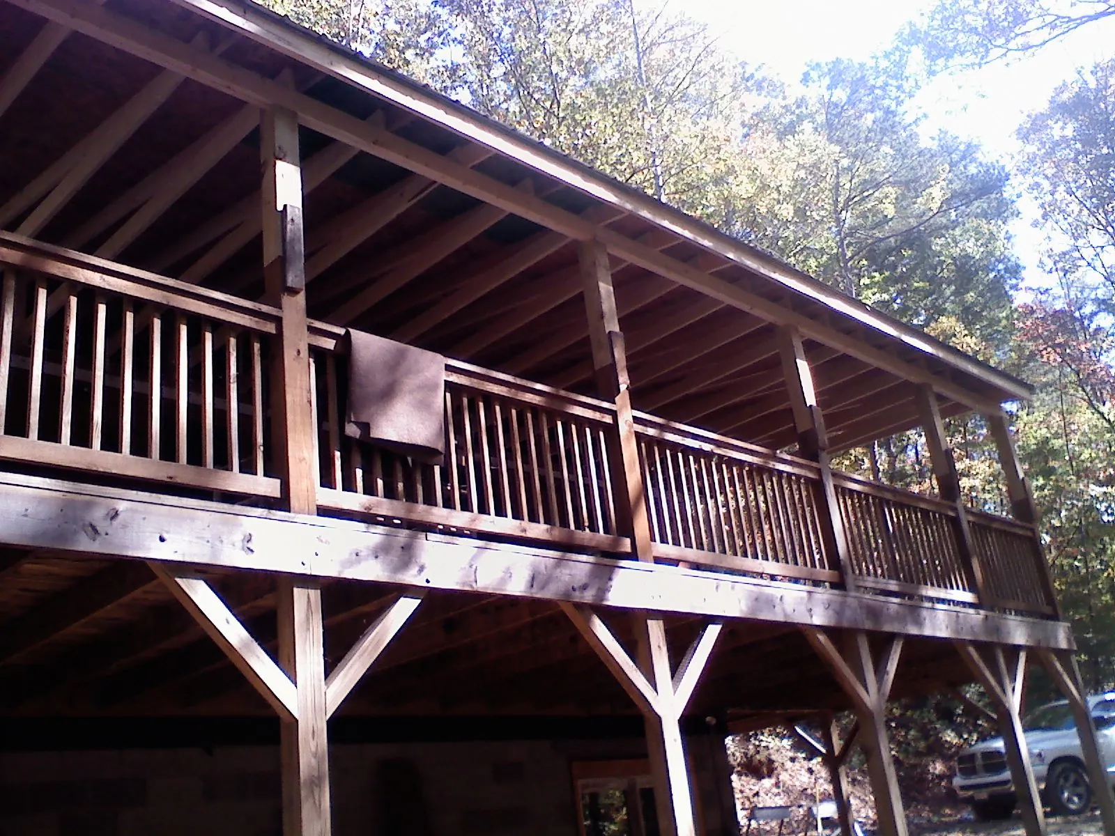 Timber framing under a new elevated porch and deck — Roof Leak Repair in Glens Falls by Roofing Brothers